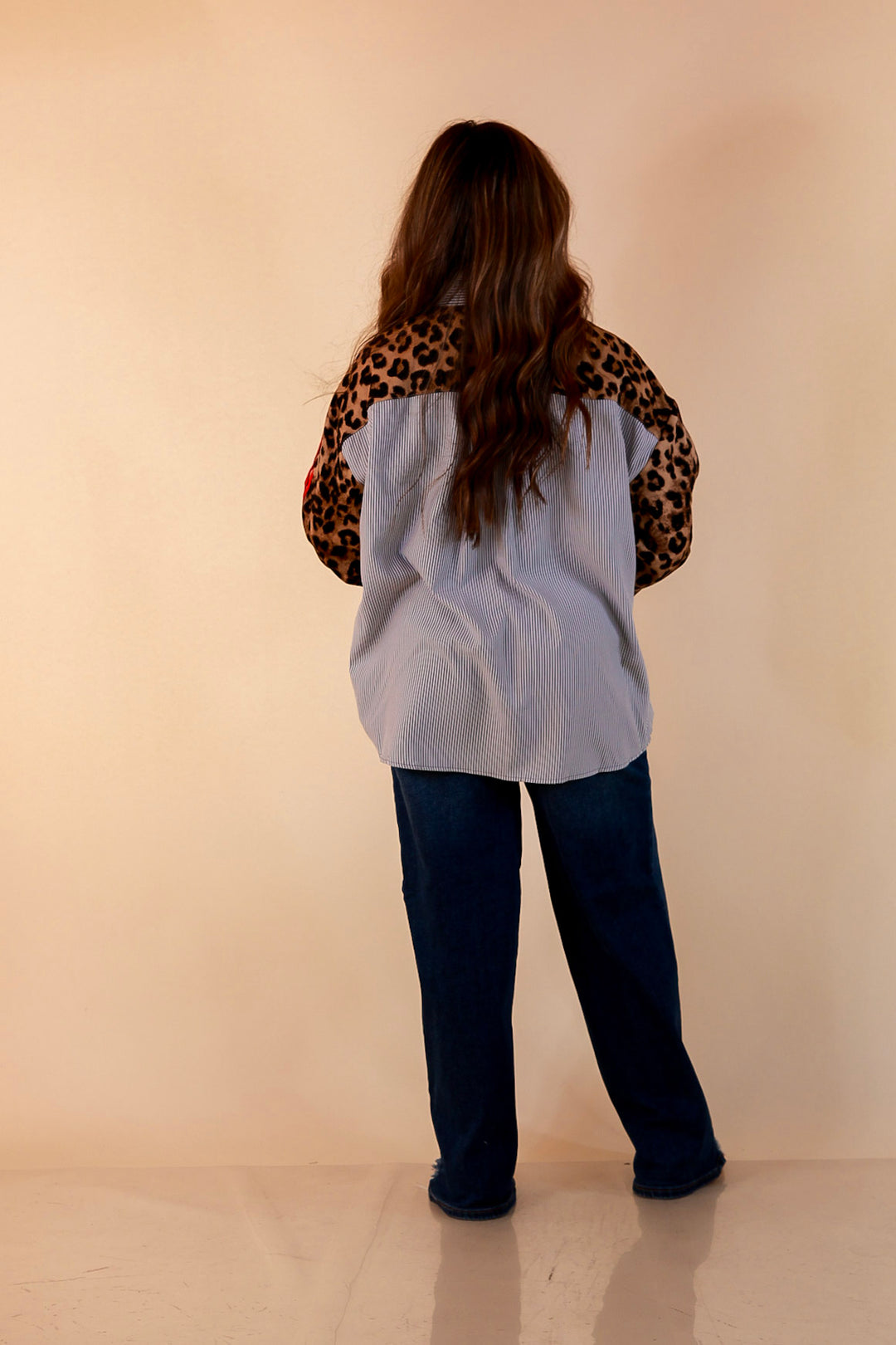 Shake It Up gray pinstripe button up top with leopard and red print sleeves