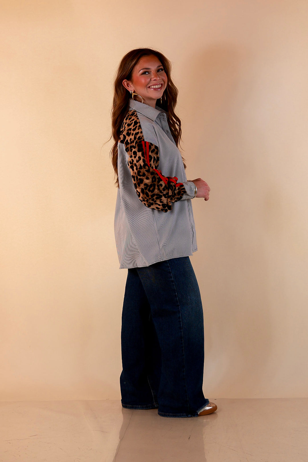 Shake It Up gray pinstripe button up top with leopard and red print sleeves