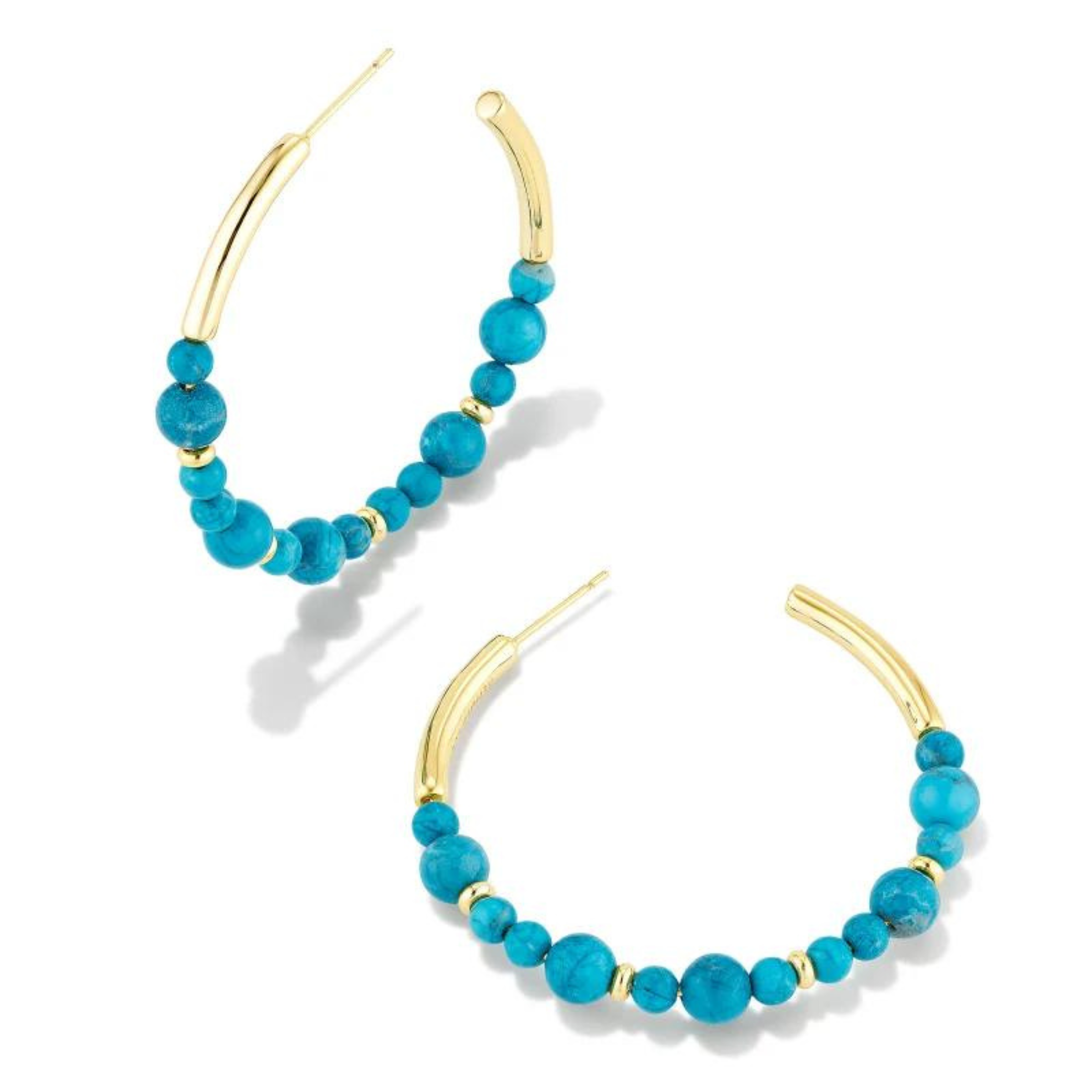 Gold hoop earrings with dark teal beads in varying sizes. These earrings are pictured on a white background. 