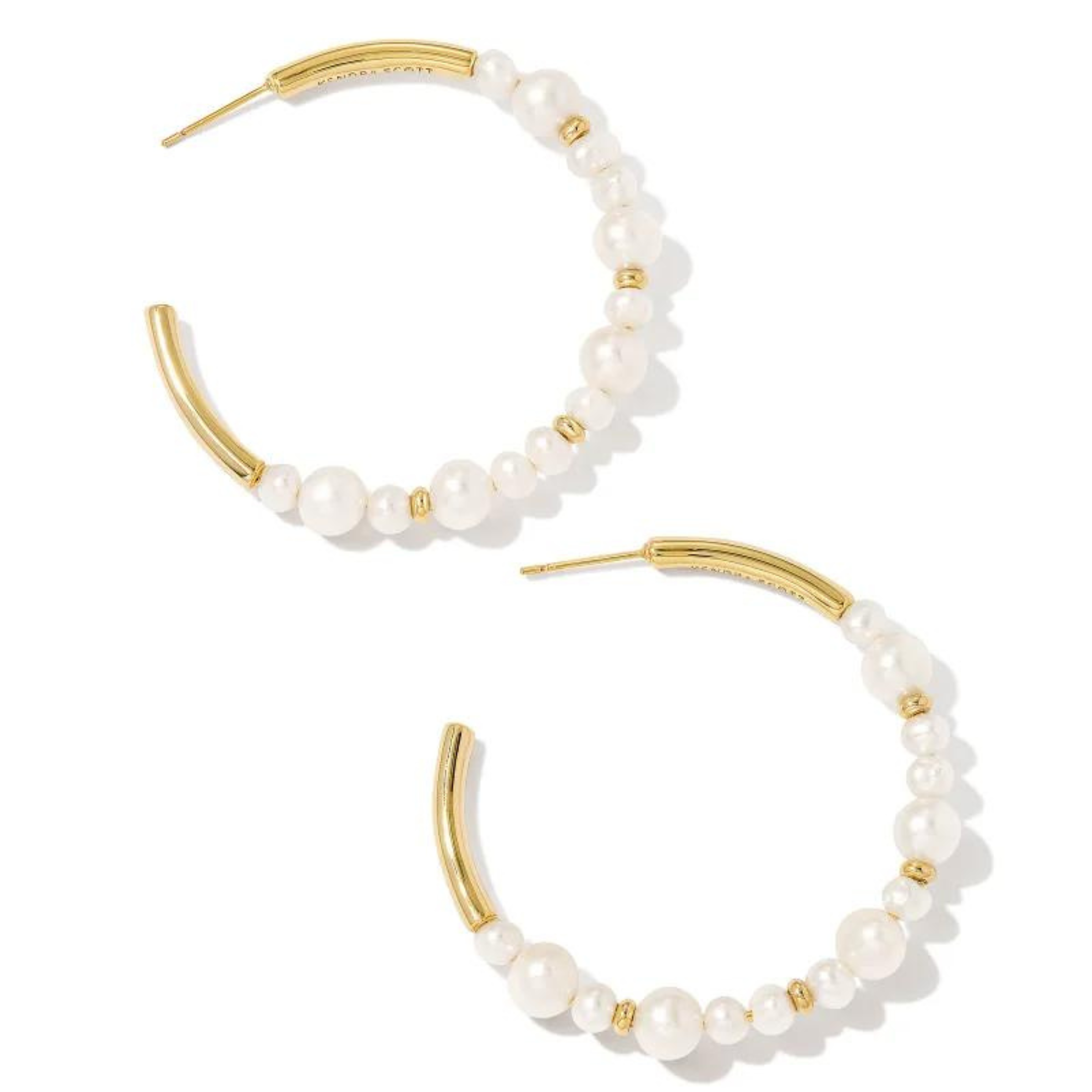 Gold hoop earrings with white pearl beads in varying sizes. These earrings are pictured on a white background. 