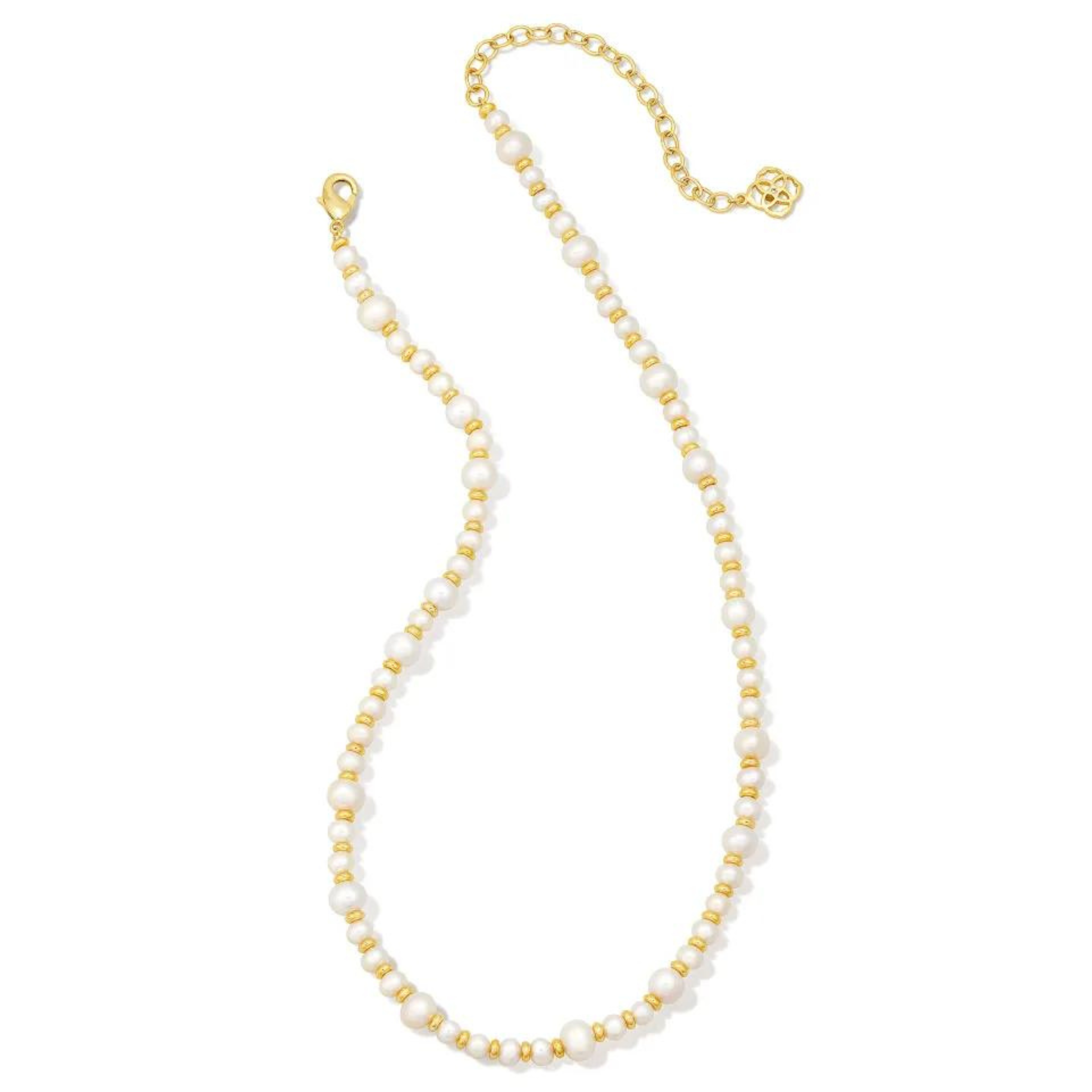 Gold spacers and varying size white pearl beaded necklace. This necklace is pictured on a white background. 