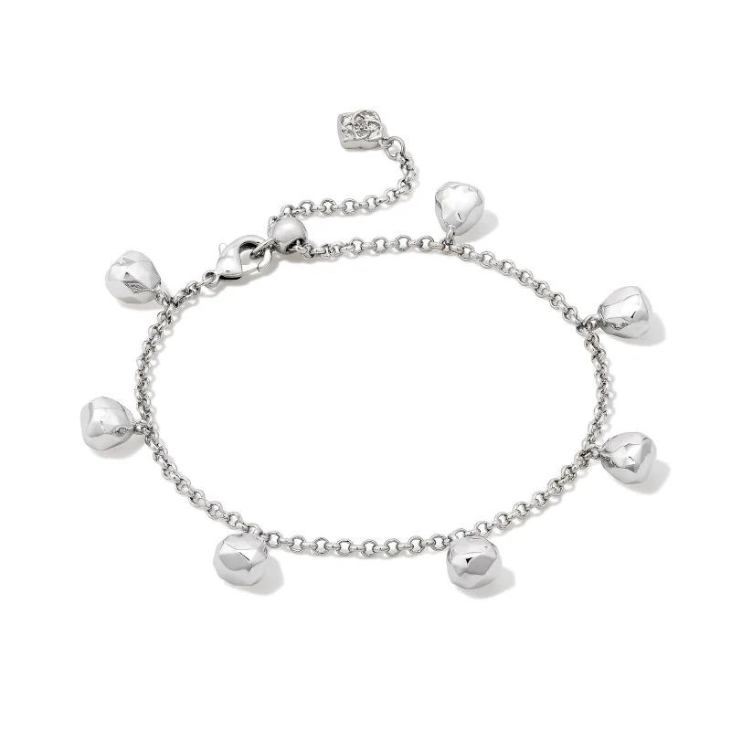 Silver chain bracelet with silver bead charms hanging off of the bracelet. This necklace is pictured on a white background. 