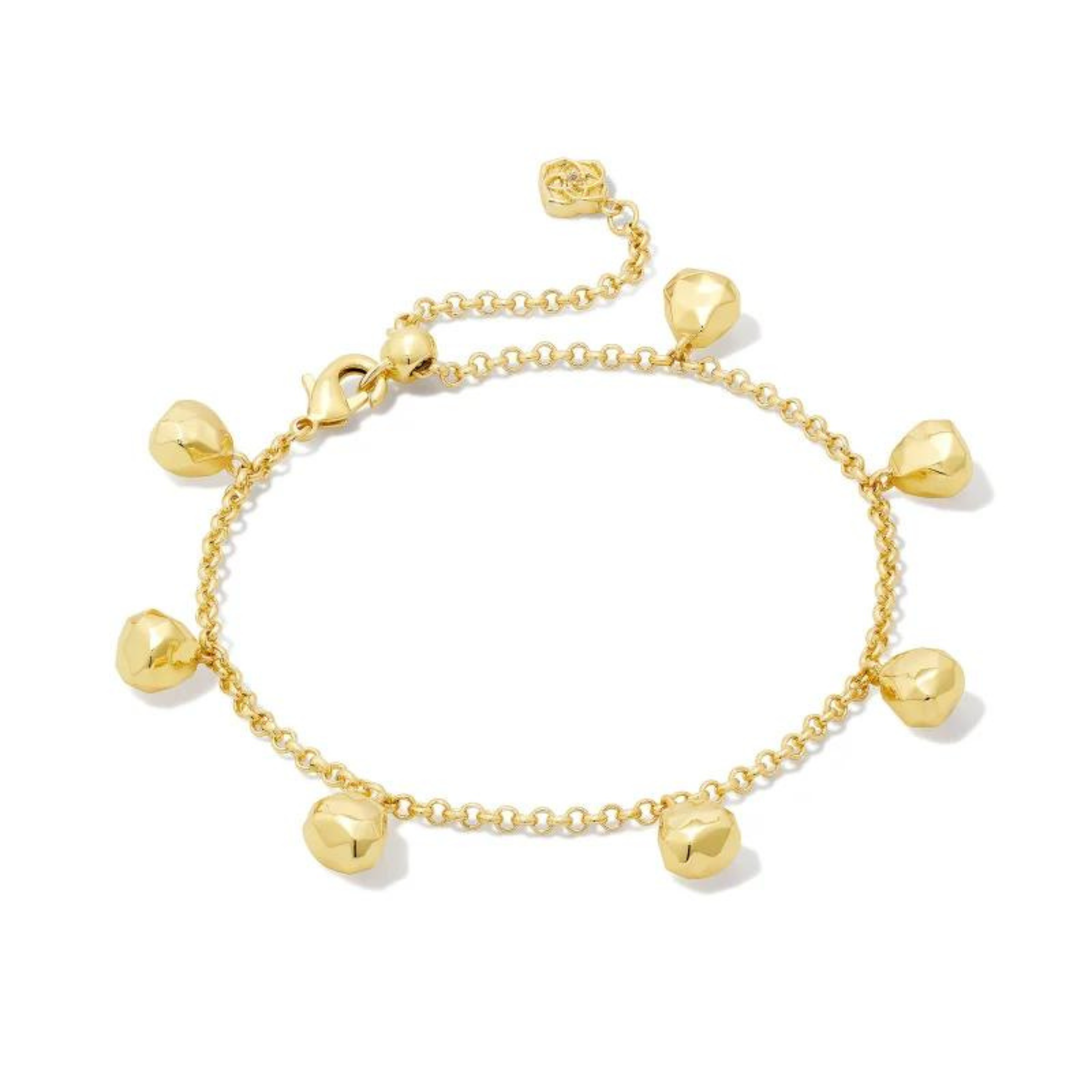 Gold chain bracelet with gold bead charms hanging off of the bracelet. This necklace is pictured on a white background. 