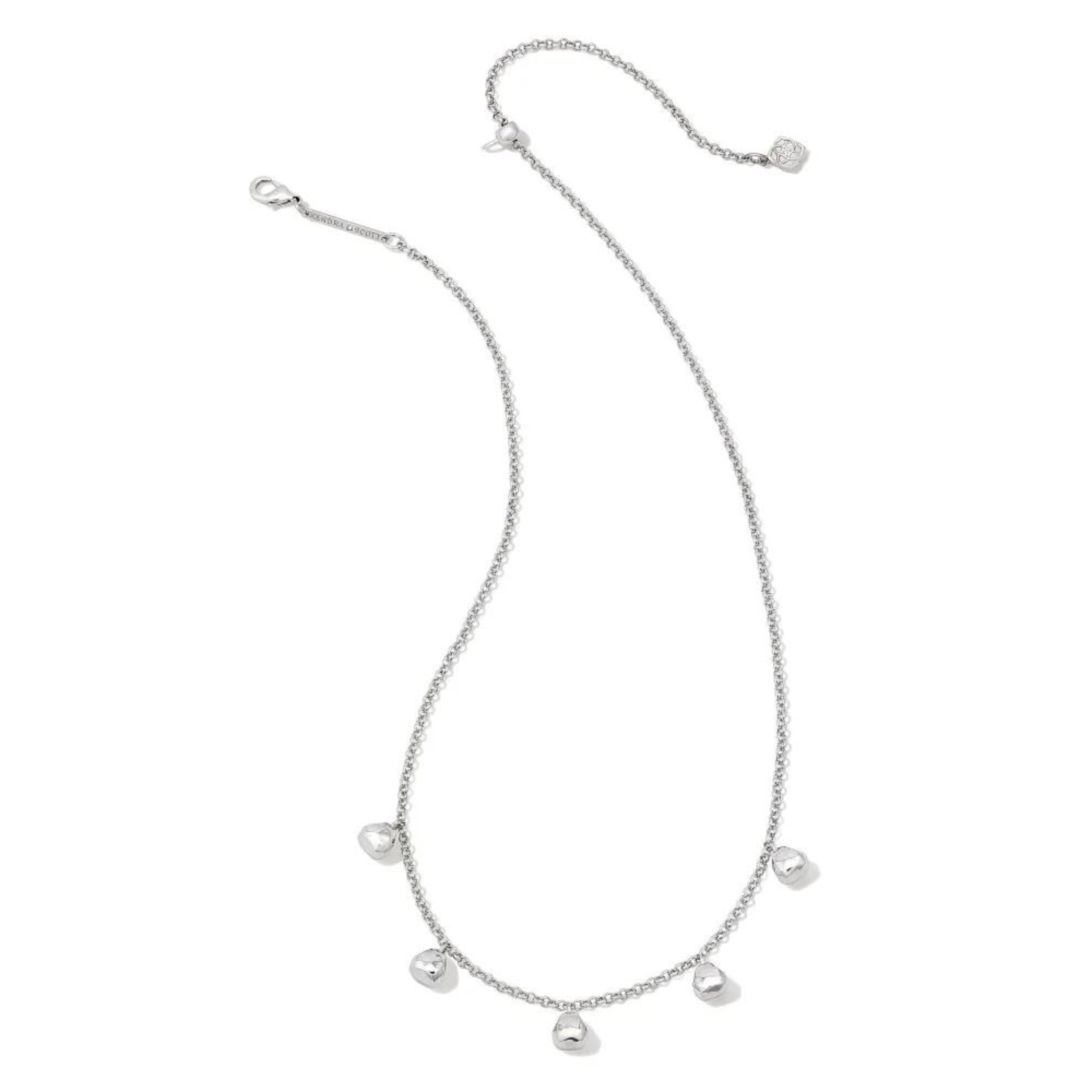 Silver chain necklace with five, silver bead charms hanging at the bottom of the necklace. This necklace is pictured on a white background. 