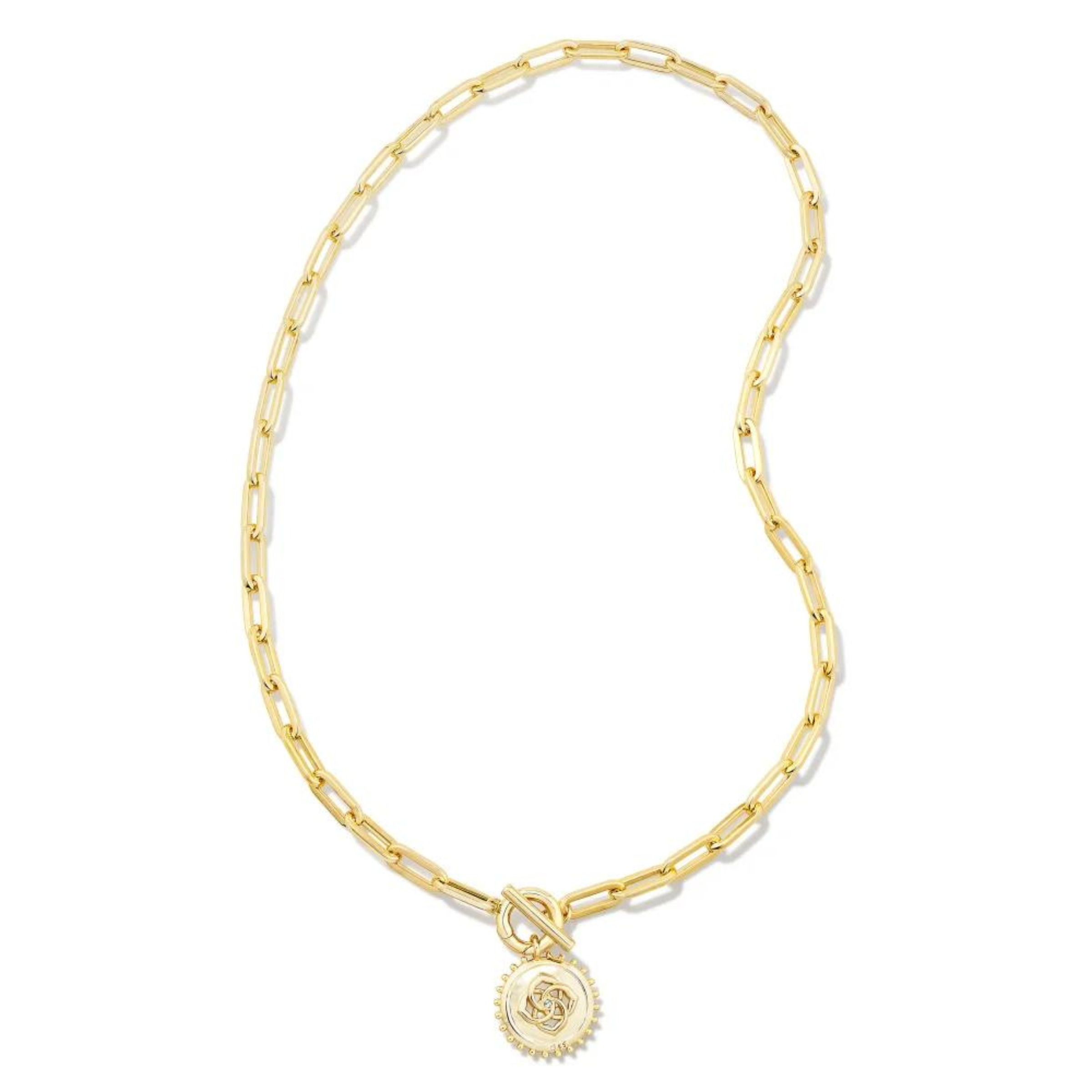 Gold, paperclip chain necklace with a toggle front clasp. This necklace also includes a gold medallion charm. This necklace is pictured on a white background. 