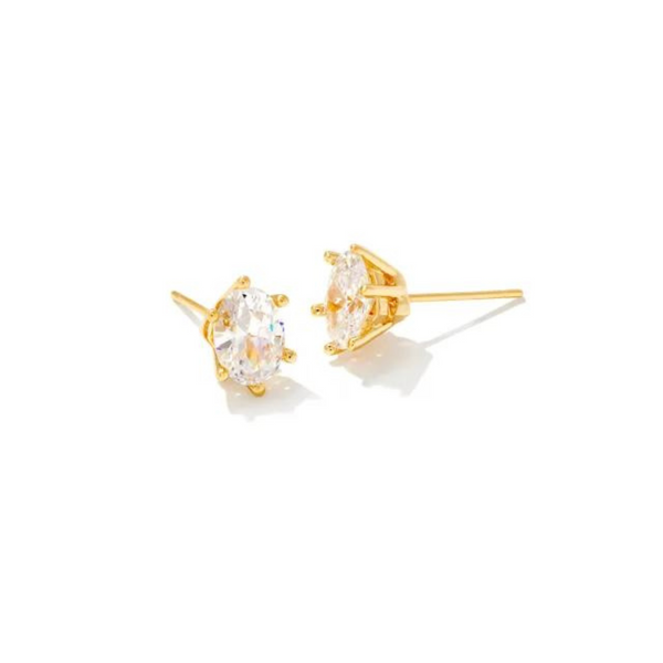 Pictured on a white background is a pair of gold stud earrings with a single oval, clear crystal. 