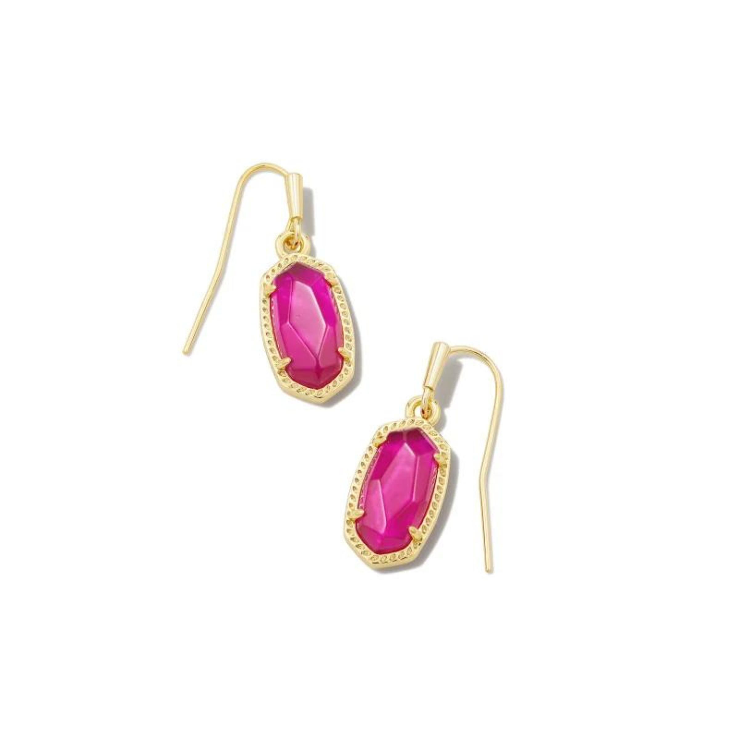 Gold, small oval drop earrings with a pink stone. These earrings are pictured on a white earring holder on a white background.