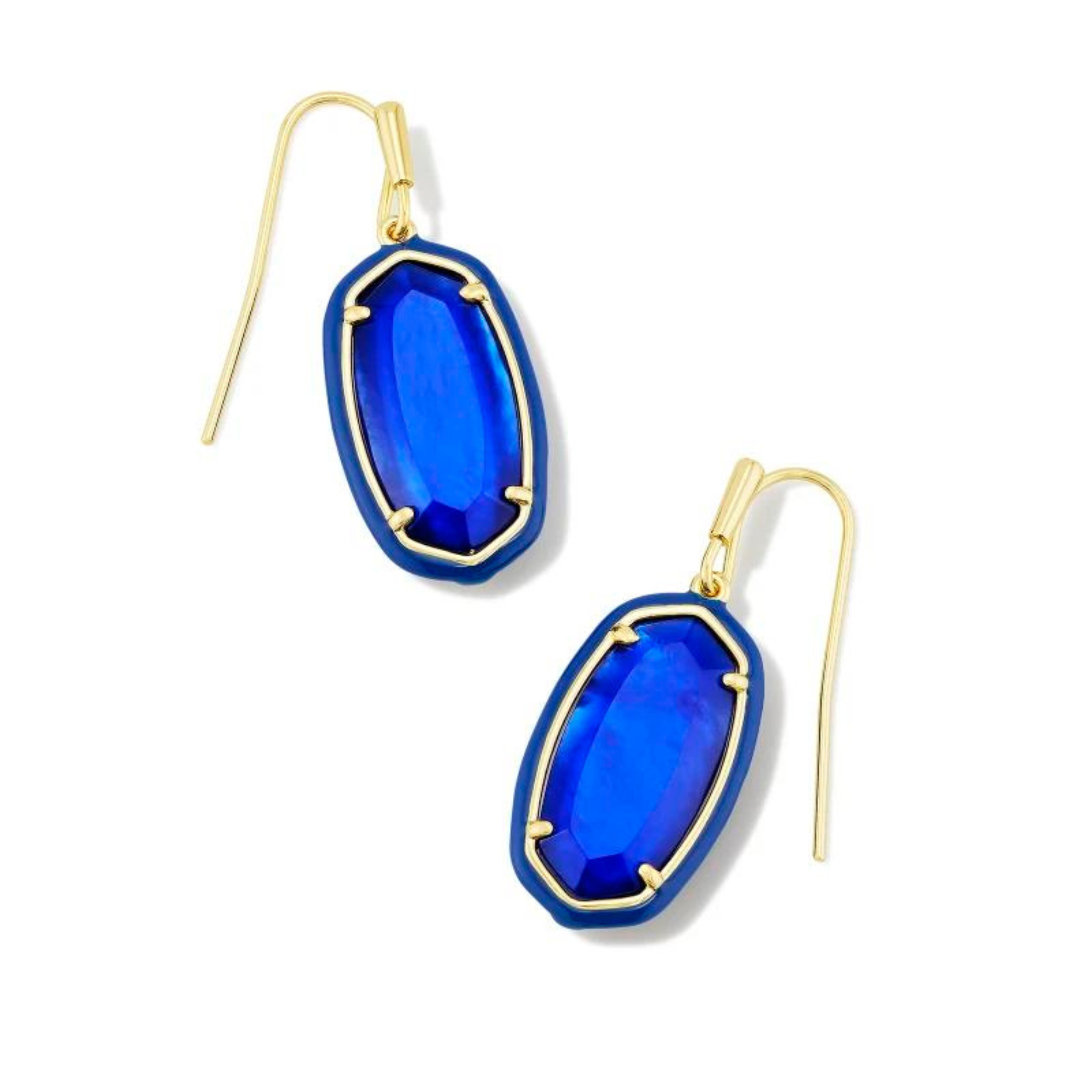 Blue framed, oval shaped drop earrings with a center blue stone and a gold fish hook earring. These earrings are pictured on a white background. 