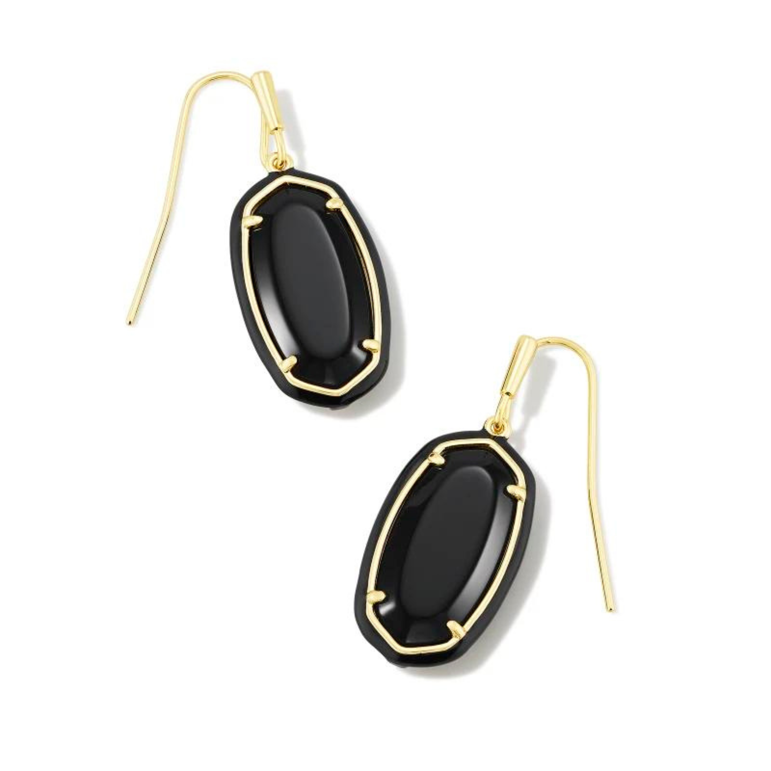 Black framed, oval shaped drop earrings with a center black stone and a gold fish hook earring. These earrings are pictured on a white background. 