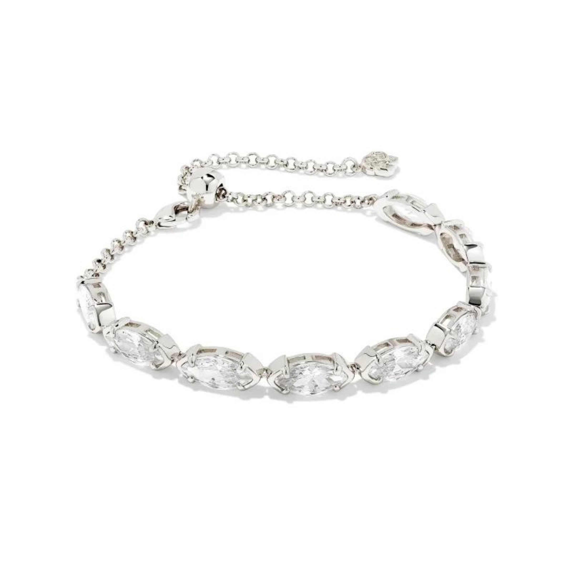 Silver tennis bracelet with clear oval crystals pictured on a white background. 