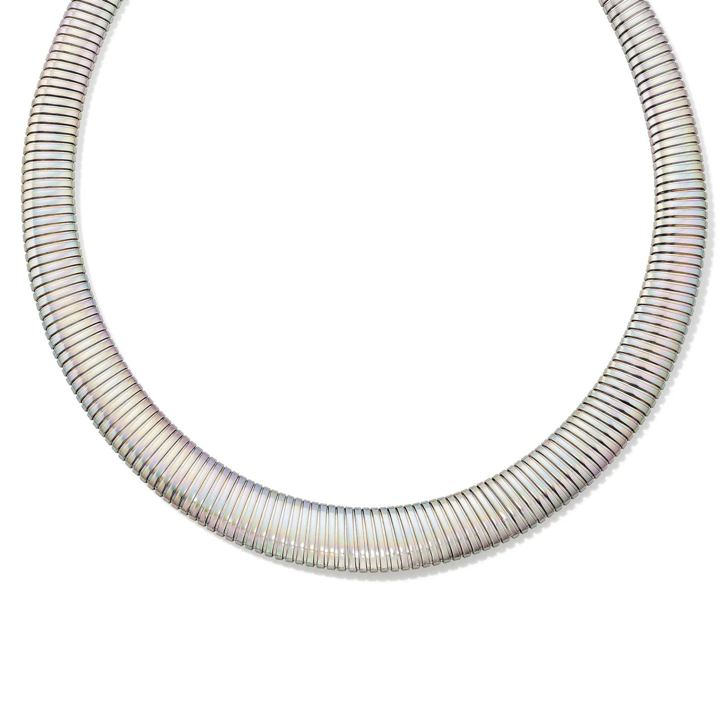 Pictured is a a silver, tubogas necklace on a white background. 