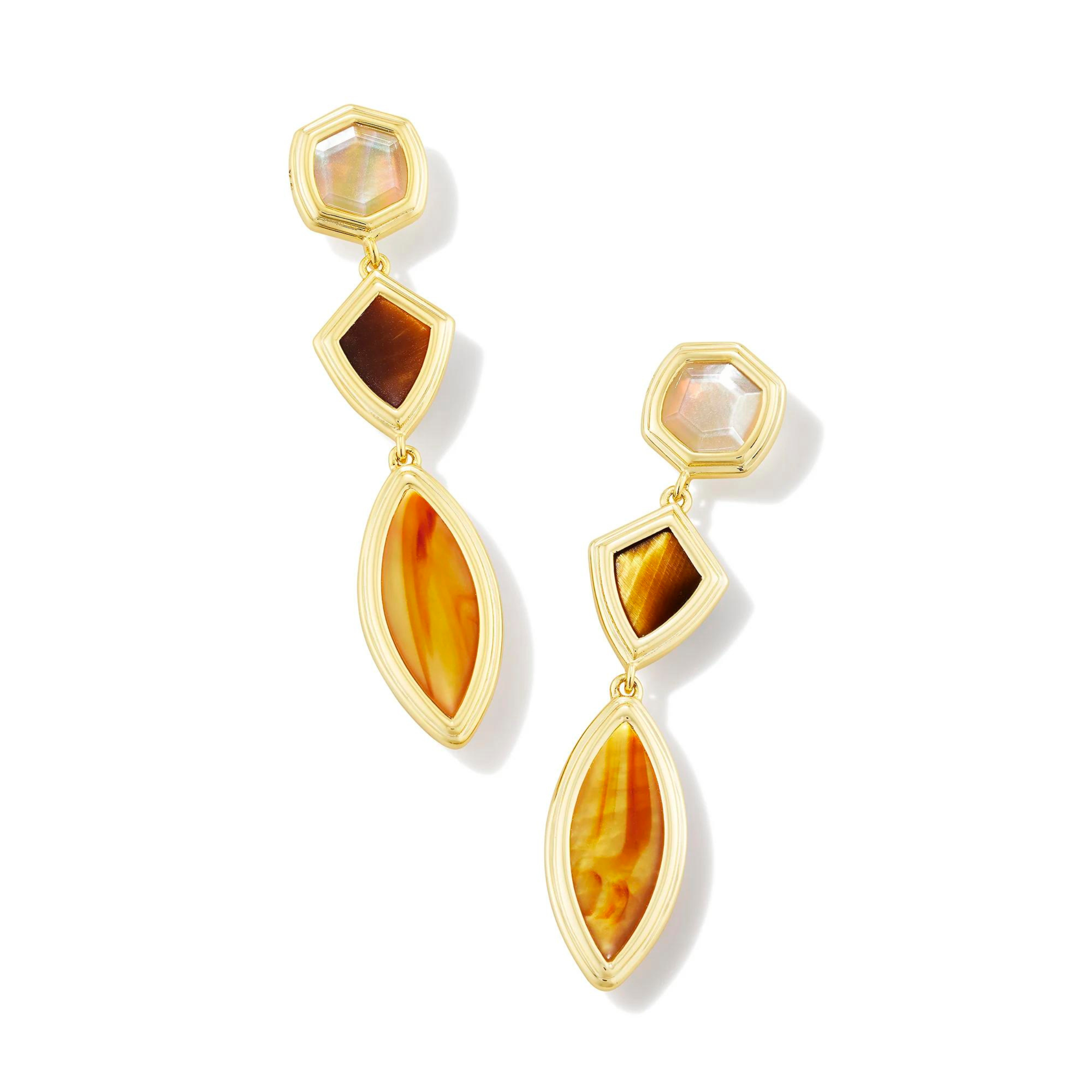 Pictured is a a pair of gold drop earrings on a white background. These earrings include three different shaped segments linked together with stones in a brown mix. 