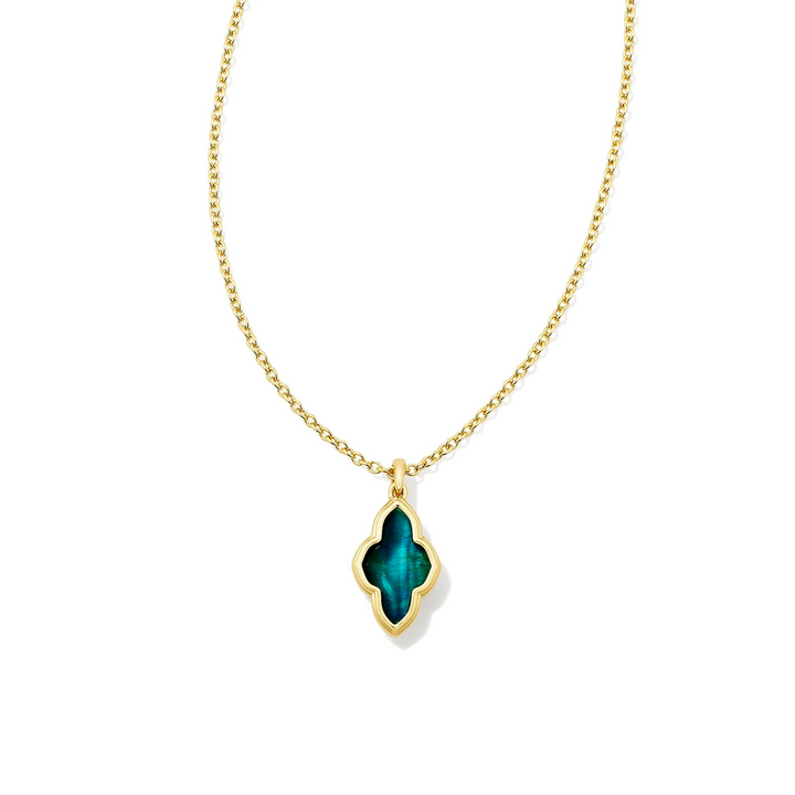 Pictured is a gold chain necklace with an abbie shaped necklace on a white background. This necklace includes a gold outline with a teal tiger's eye stone.  