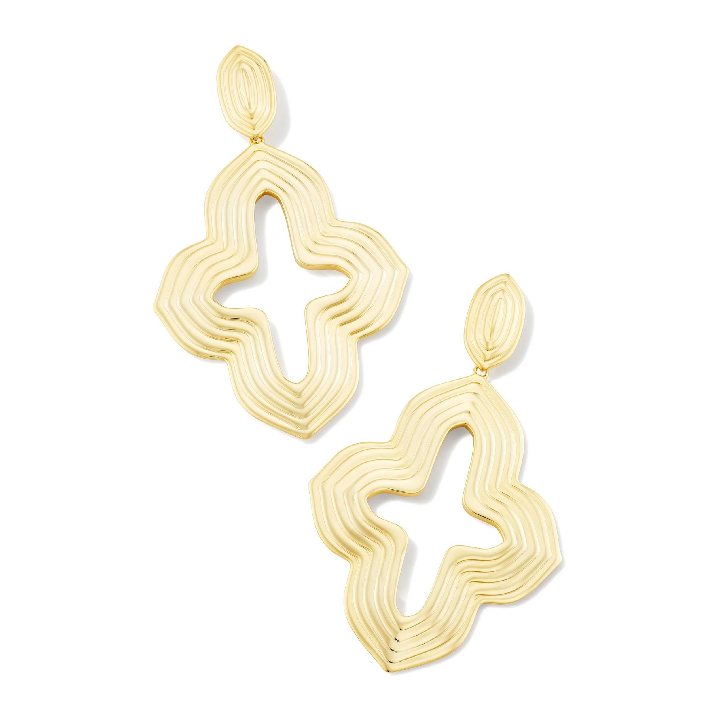 Pictured is a gold, statement drop earrings on a white background.    