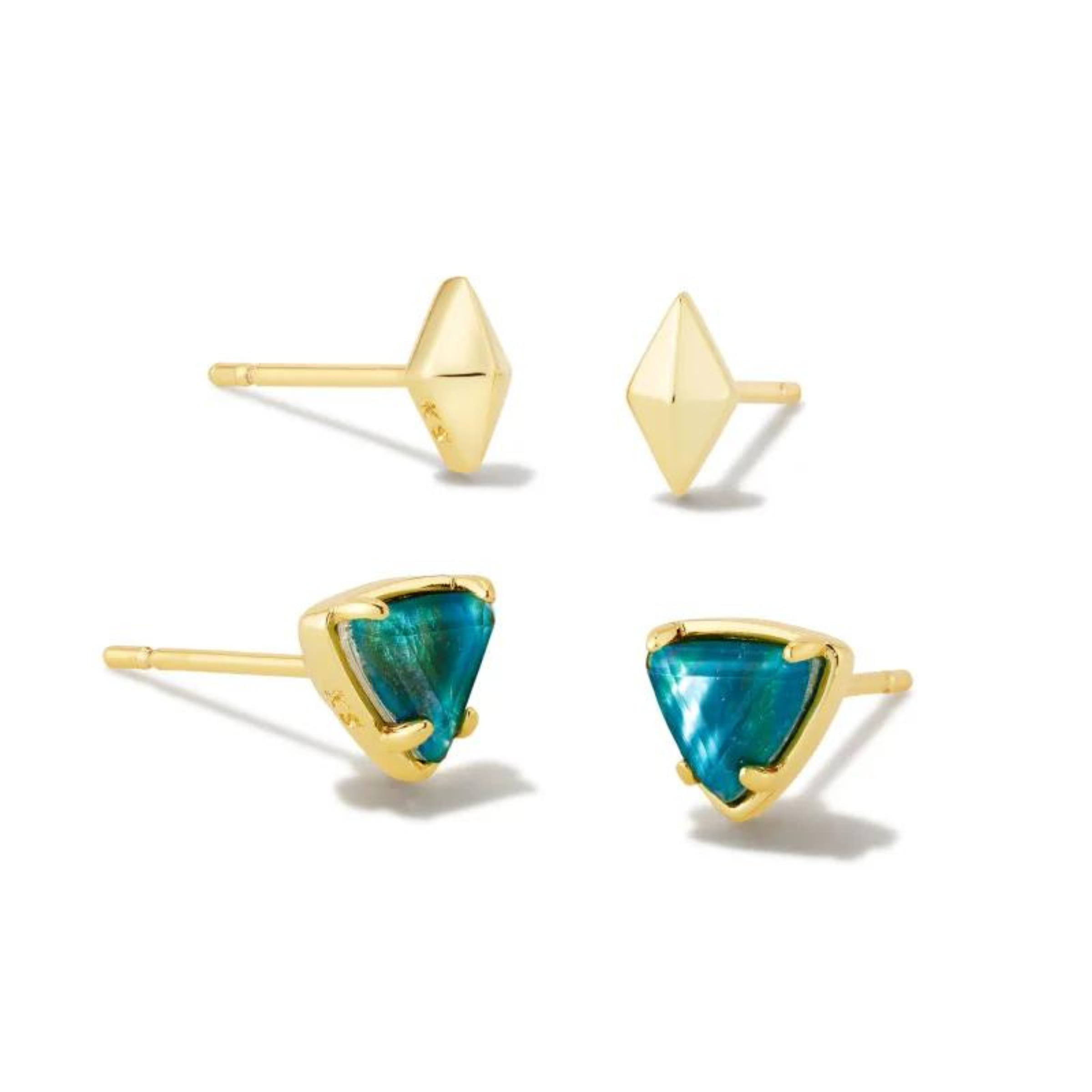 Pictured on a white background are a set of two stud earrings with gold ear posts. The top pair has a gold, diamond shaped stud. The bottom pair are gold triangle studs with teal centers. 
