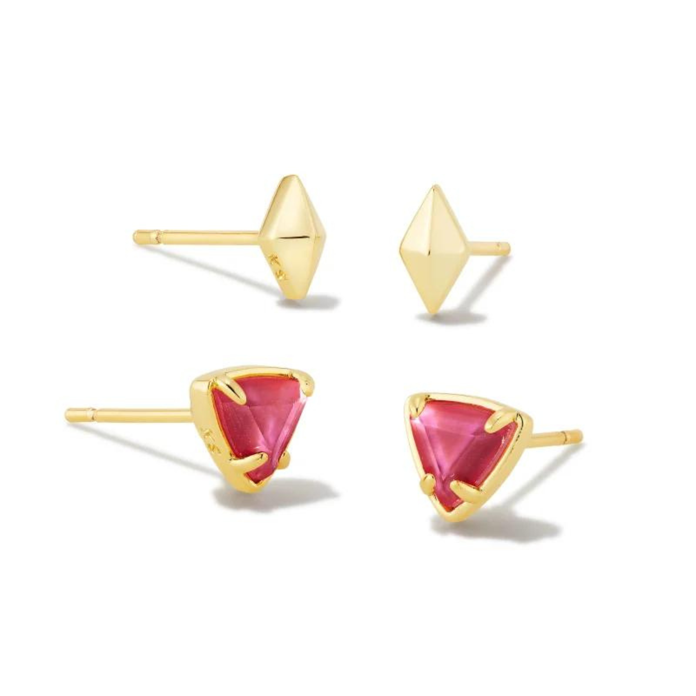 Pictured on a white background are a set of two stud earrings with gold ear posts. The top pair has a gold, diamond shaped stud. The bottom pair are gold triangle studs with magenta centers. 