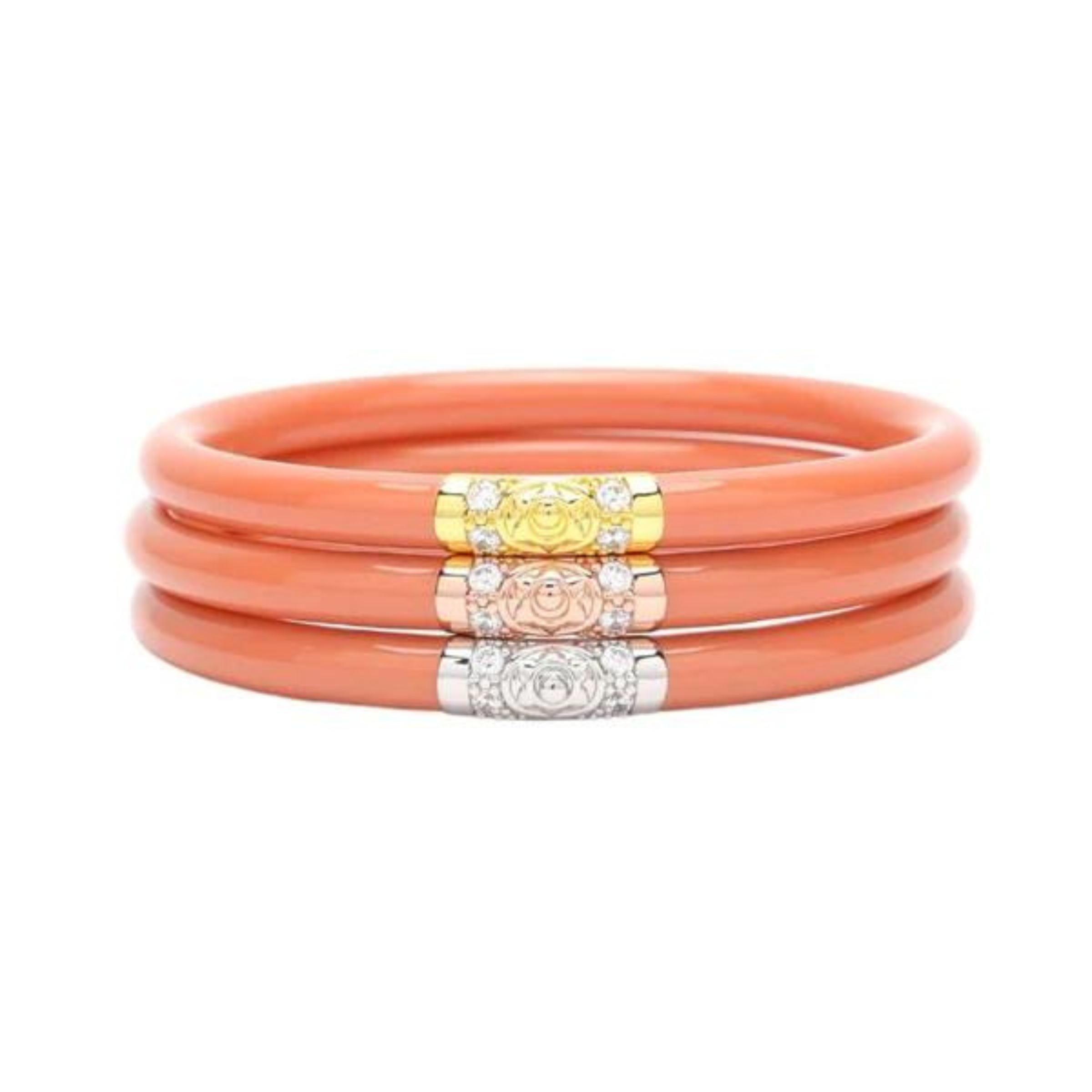 Three coral pink plastic, tube bracelet with one bracelet with a gold segment, one with a rose gold segment, and the other with a silver segment. These bracelets are pictured on top of each other on a white background. 