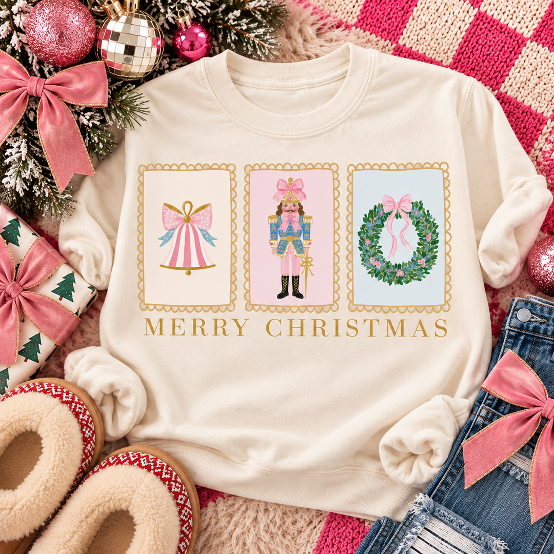 Simple Classic Stamp Christmas graphic tee or sweatshirt on ivory with three vintage-style stamps with a bow, nutcracker and wreath above Merry Christmas