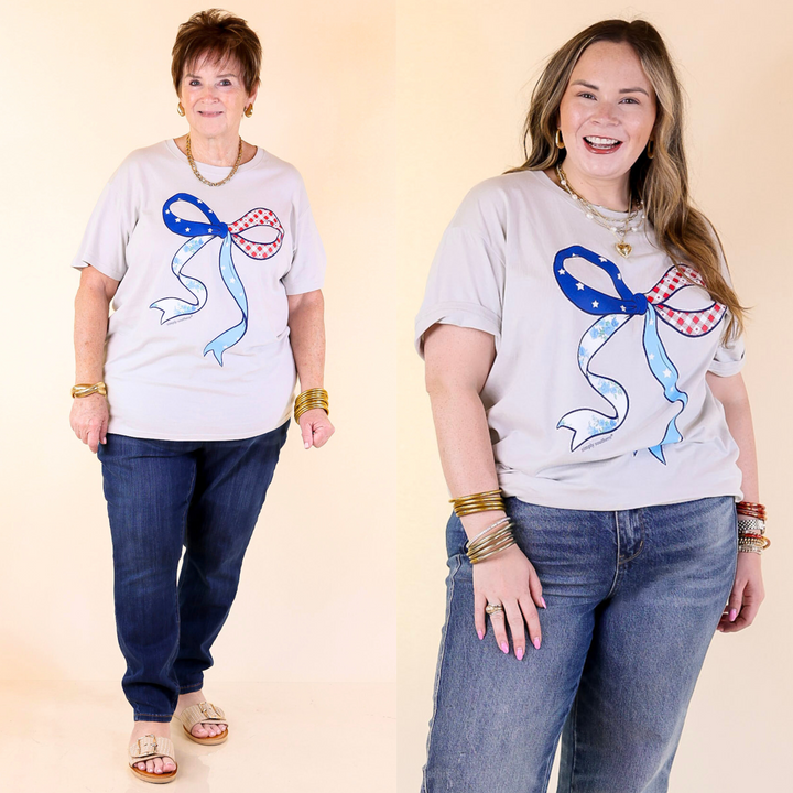 Show your patriotic side with this comfy tee featuring a bold USA bow on the front and a mini one on the back. Sizes small through plus sizes. 