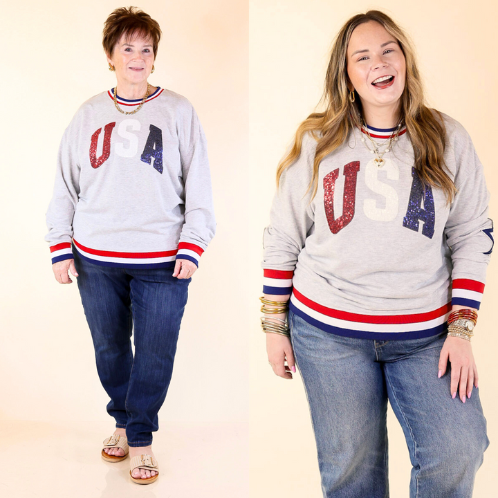 Stay cozy and patriotic in this varsity-style crew with sequin USA lettering, star sleeve details, and red, white, and blue trim. Size small through plus sizes.