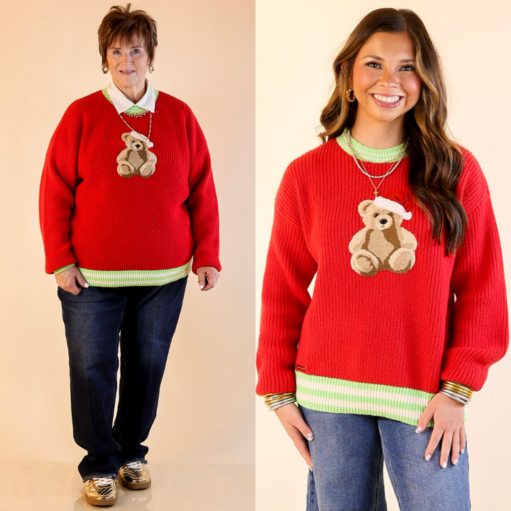Models are wearing red sweaters with green trim featuring teddy bear designs on a beige background