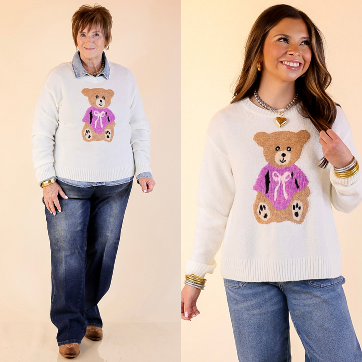 Two women wearing sweaters with teddy bear with bow designs in cream on a beige background