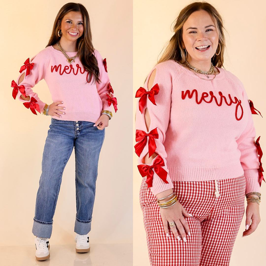 Models wearing pink sweaters with red 'merry' text and bow details, one in jeans and the other in red gingham checkered pants.