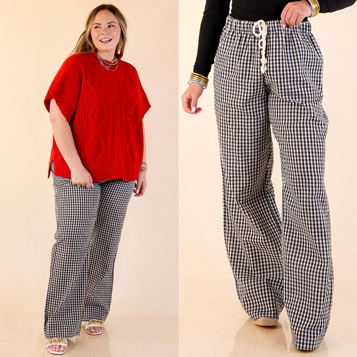 Models wearing gingham black checkered pants on a beige background