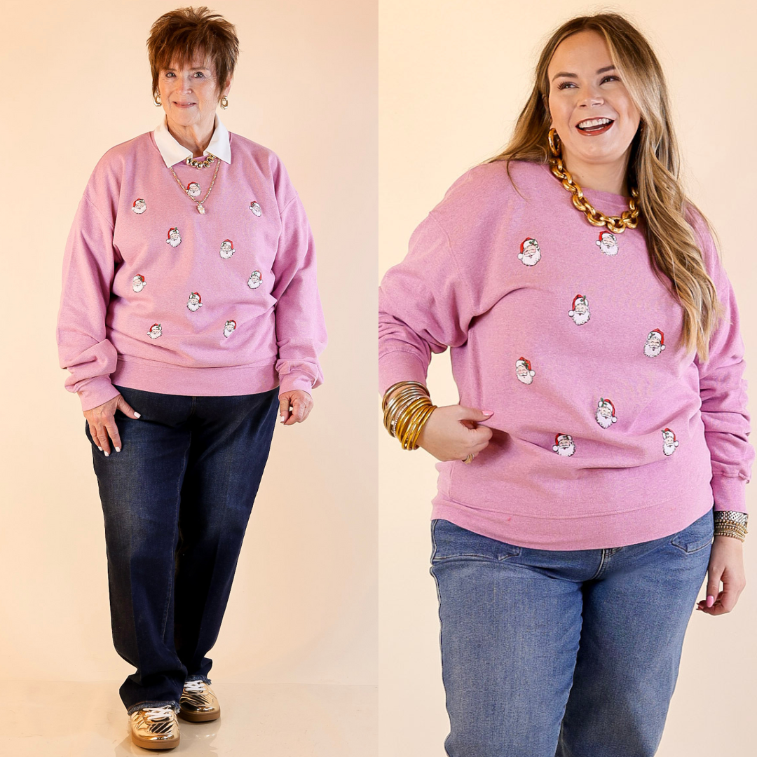 Models are wearing santa graphic crewneck sweatshirt in bubblegum pink with Judy Blues. 