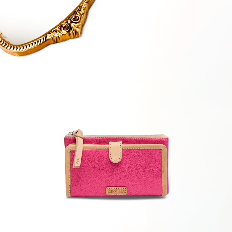 Pink wallet with beige accents on a white background