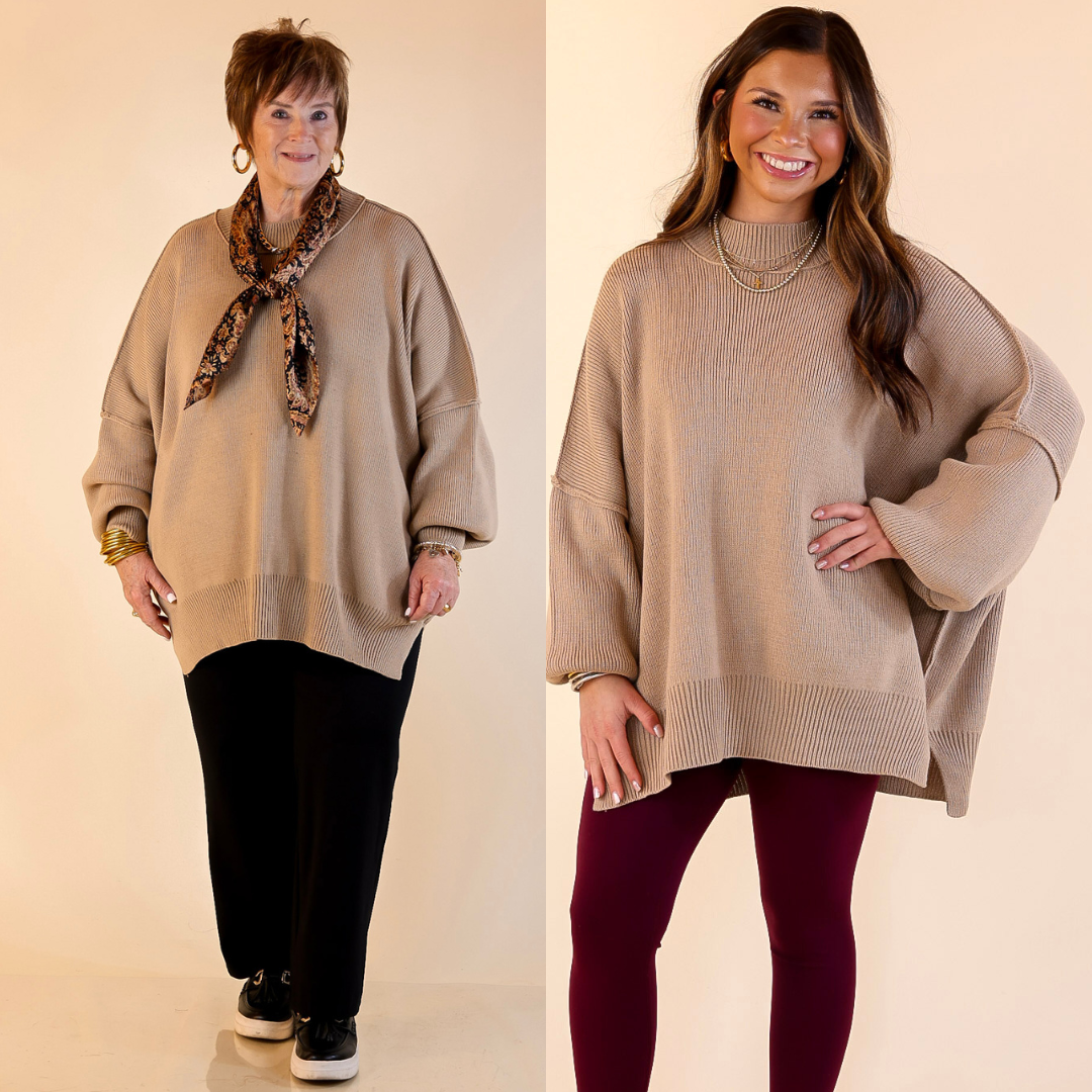 Models are wearing mocha brown oversized sweater with side slit. One model is showcasing a smaller size while the other is wearing a larger size.
