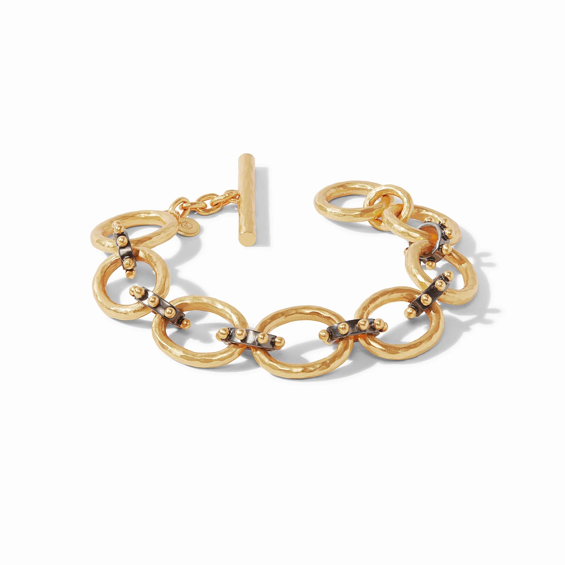 Gold chain link bracelet pictured on a white background. 