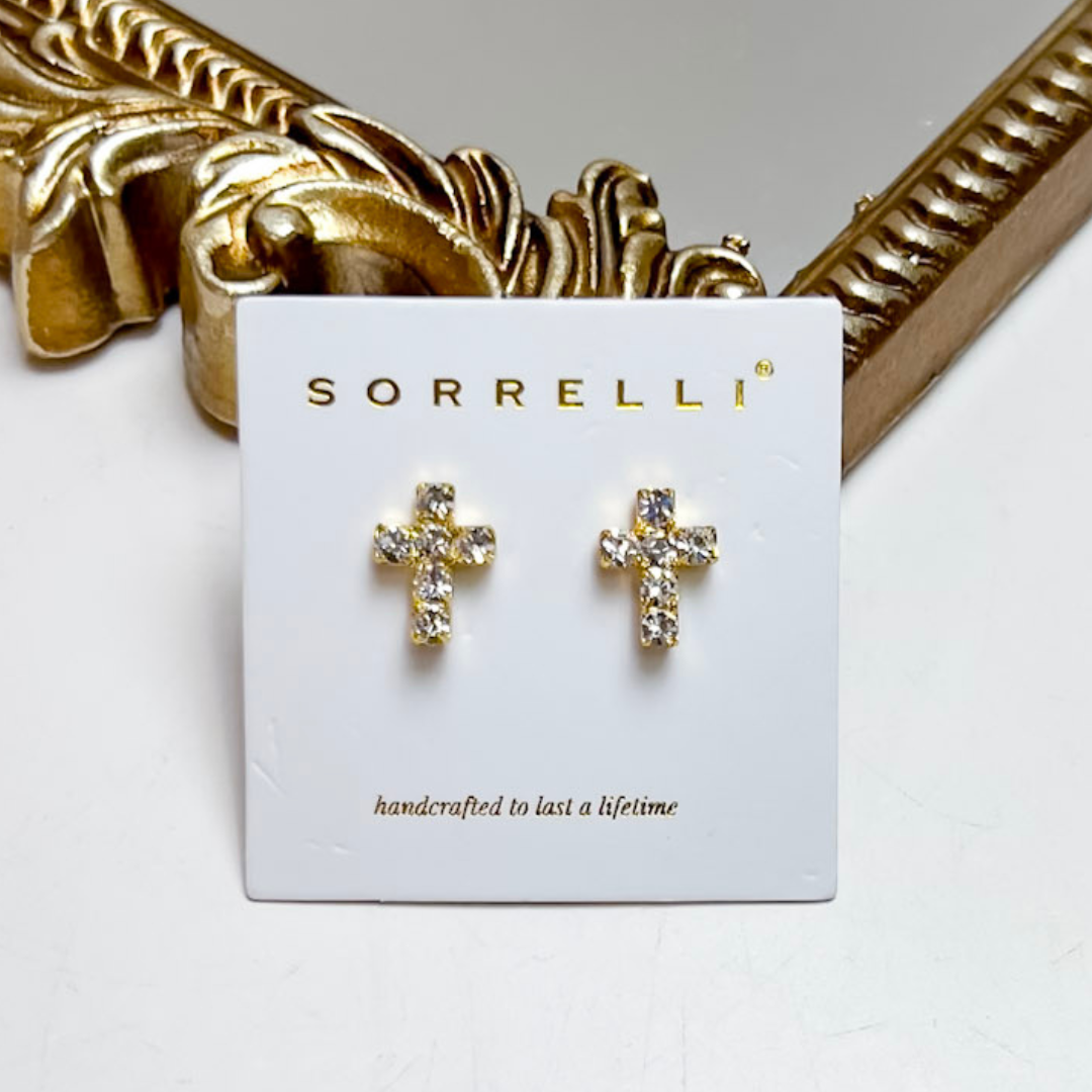 Sorrelli Carly Cross Stud Earrings in Bright Gold Tone featuring a classic cross silhouette accented with sparkling clear crystals.