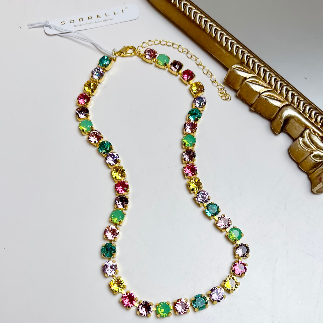 Sorrelli Matilda Repeating Tennis Necklace in Bright Gold Tone and Candy Pop featuring round multicolor crystals in pink, green, turquoise, lavender, and yellow.