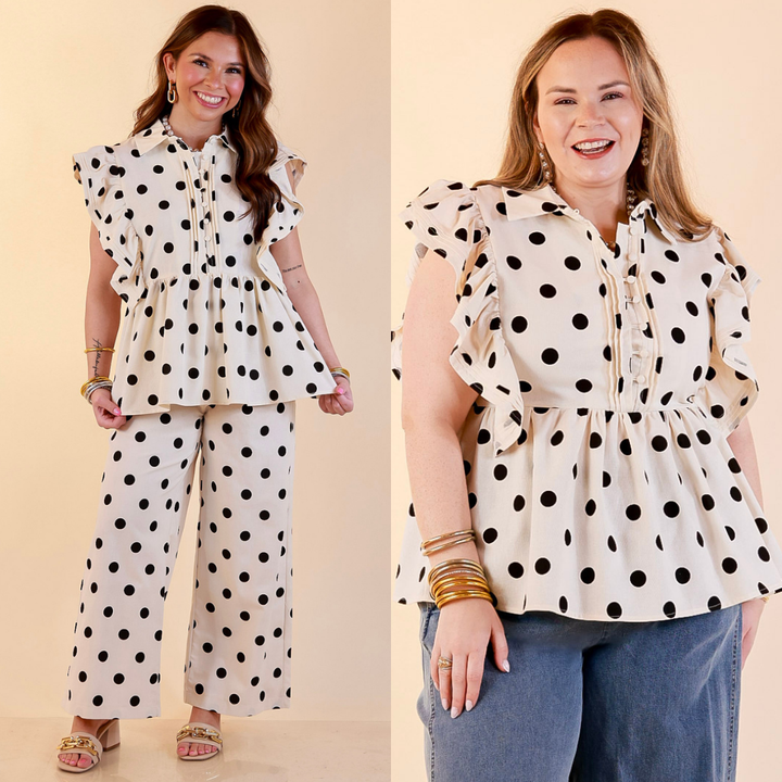 Models are wearing Ruffle Cap Sleeve Button Front Peplum Top with Black Polka Dot Print in Cream with bottoms against a beige backdrop. 