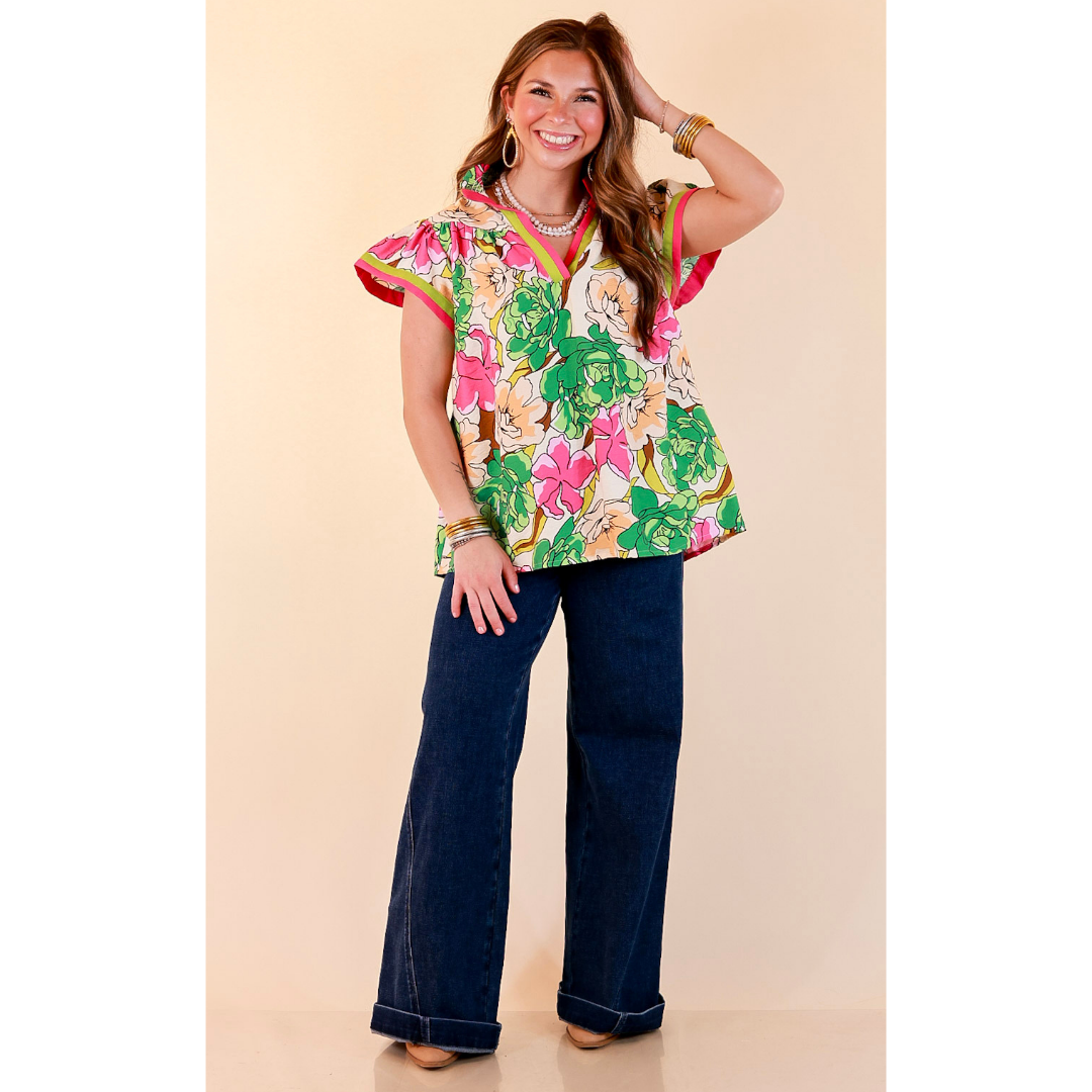 Spring Symphony Floral Print Flutter Sleeve Top with Contrast Trim Split Neckline in Pink and Green