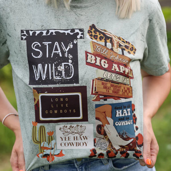 Person wearing a gray t-shirt with various cowboy-themed patches and text.