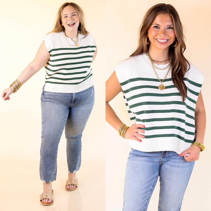 Woman wearing a green and white striped top and blue jeans against a beige background.