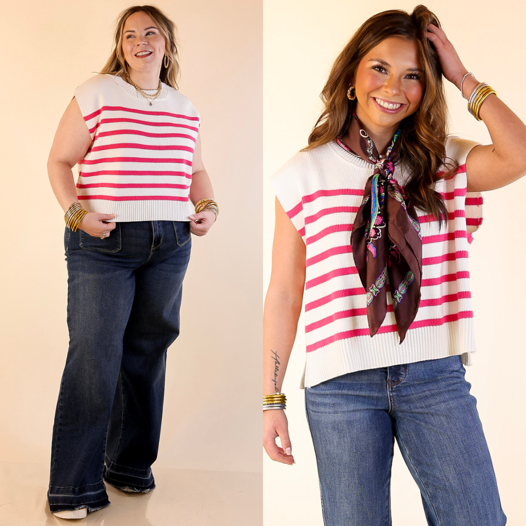 Models are wearing Drop Shoulder Knit Sweater in White with Hot Pink Stripes with blue jeans on a beige background.