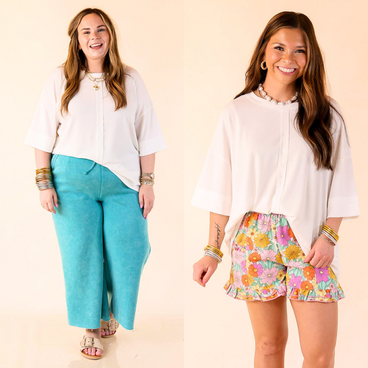 Easy, effortless, and elevated. This crew neck features front seam detailing and an extended hem for a flattering twist on your everyday basic. In sizes S/M to L/XL.