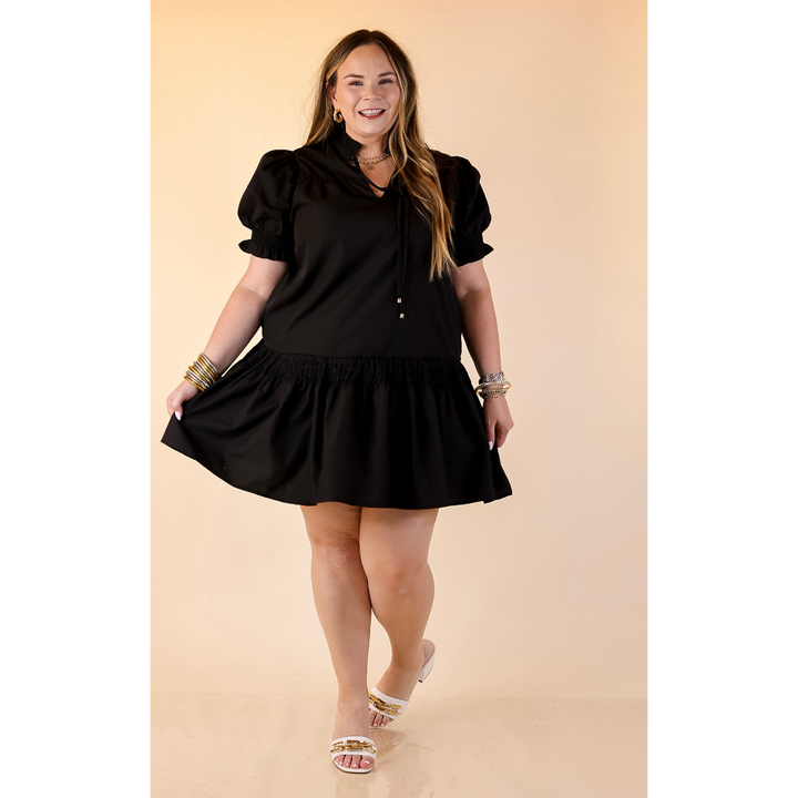 Sugar and Chic Peplum Solid Dress with Puff Sleeves in Black
