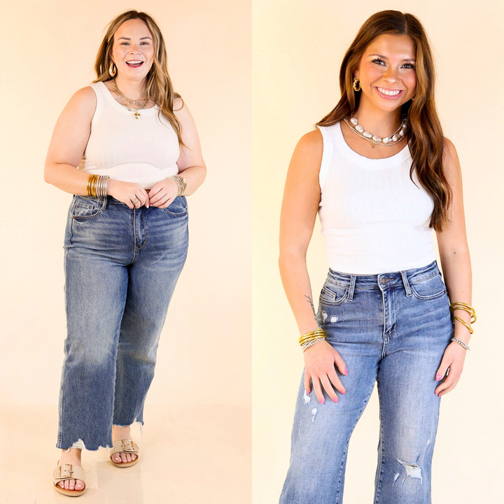 This top features a trendy ribbed texture, sleeveless design, and cropped length. Sizes small through large.