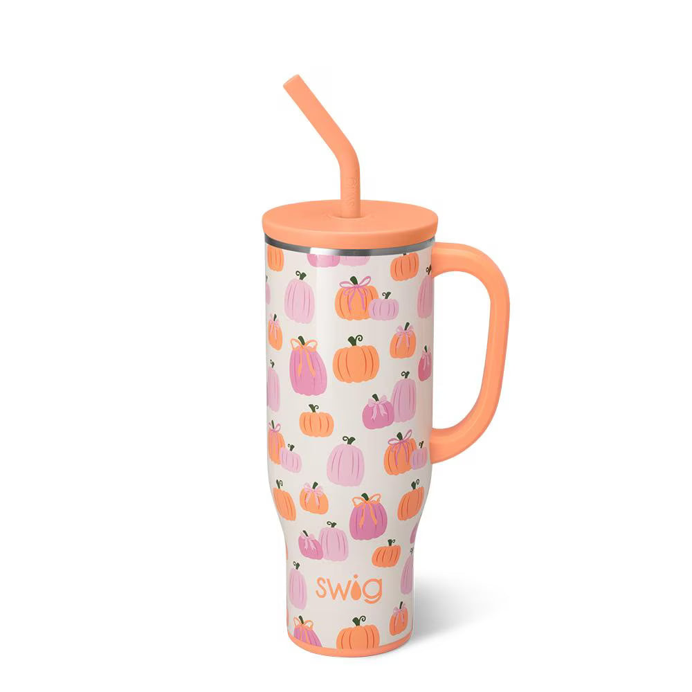 Tumbler with pumpkin pattern and orange lid on a white background