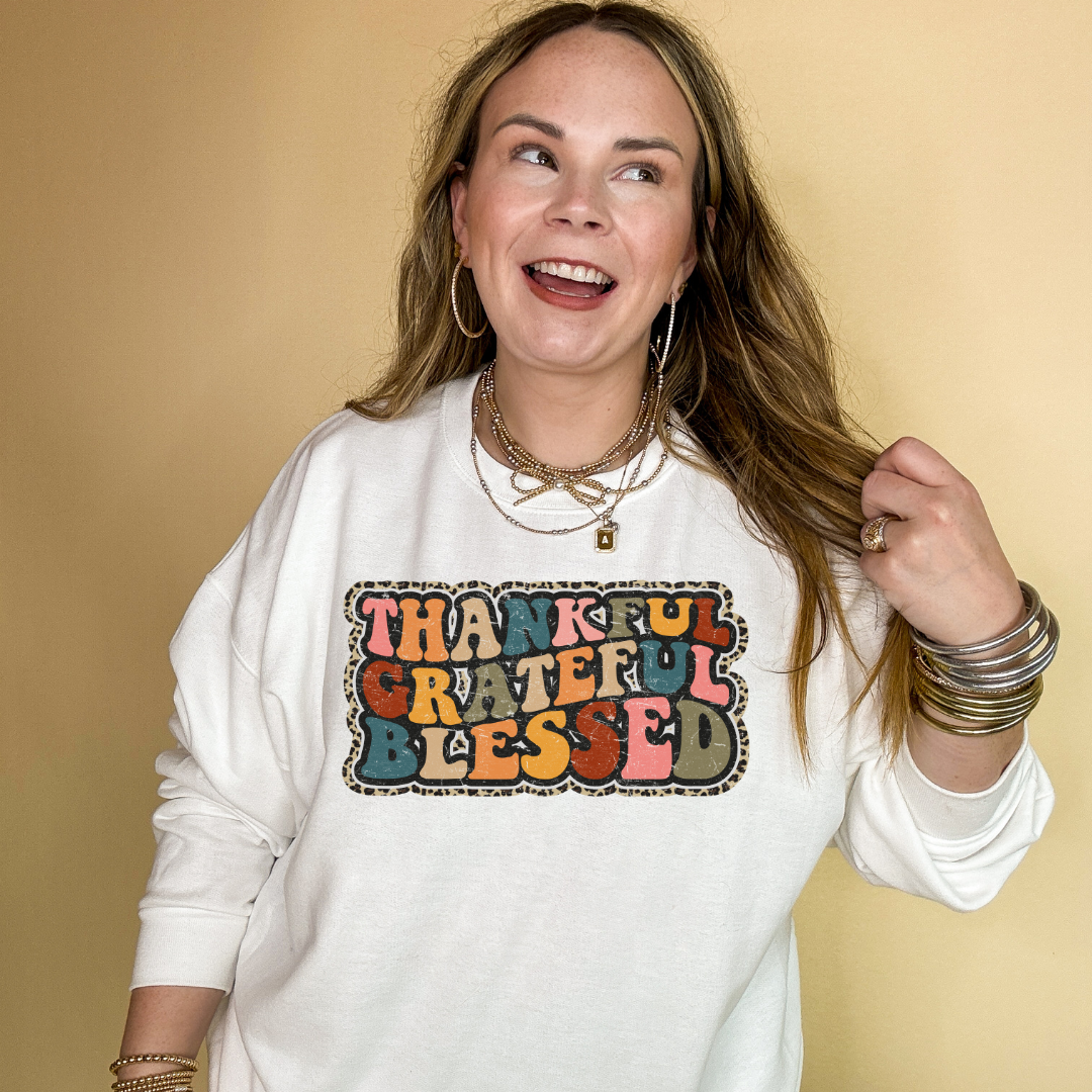 Online Exclusive | Thankful, Grateful, Blessed with Cheetah Print Outline Graphic Sweatshirt in Multiple Color Options