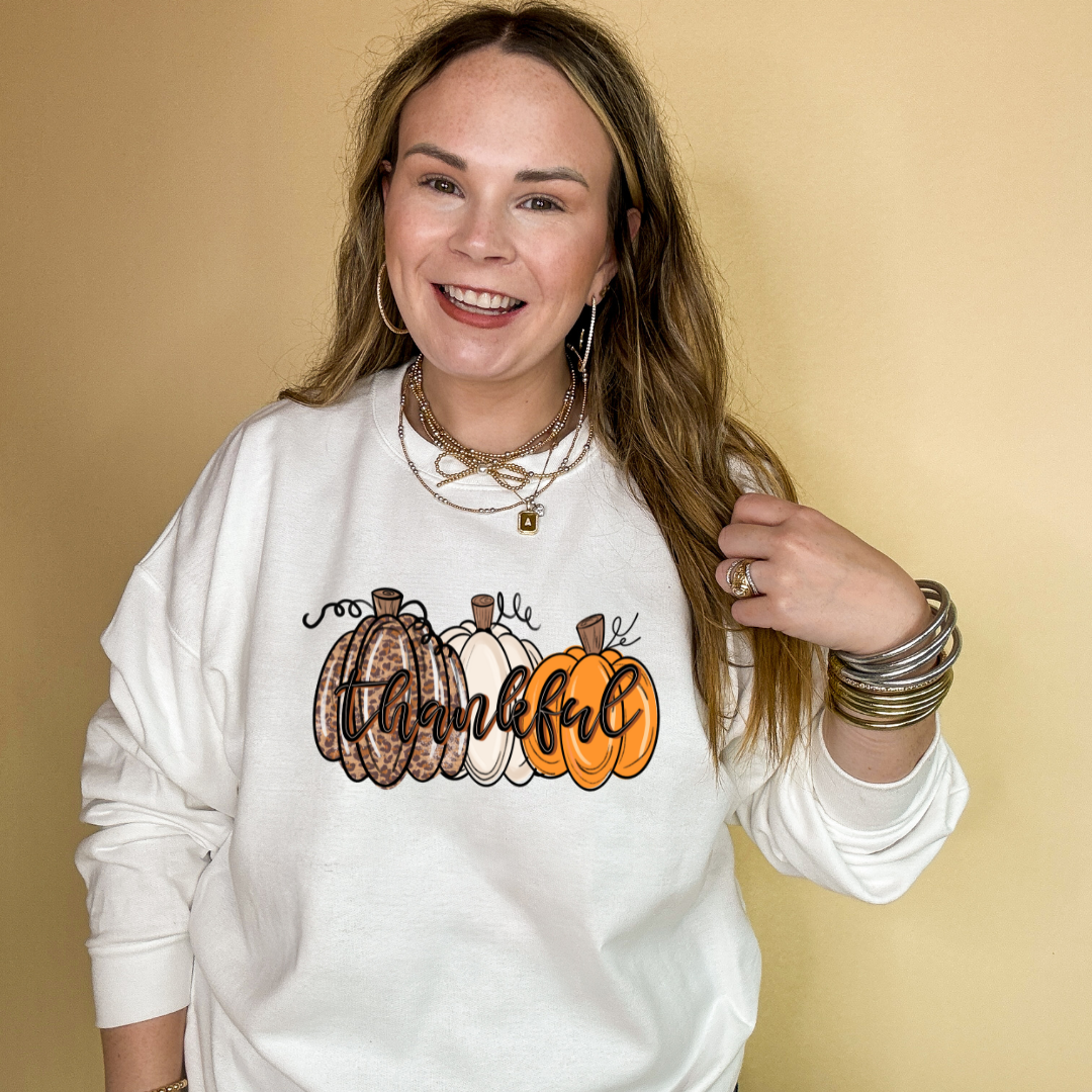 Online Exclusive | Thankful Pumpkins Cheetah, white and Orange Graphic Sweatshirt in Multiple Color Options