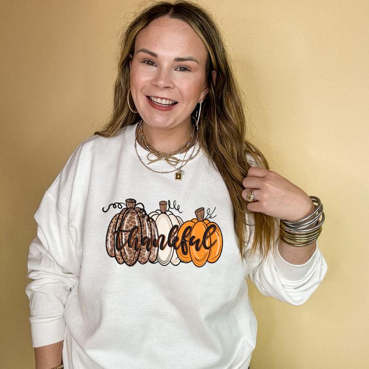Online Exclusive | Thankful Pumpkins Cheetah, white and Orange Graphic Sweatshirt in Multiple Color Options