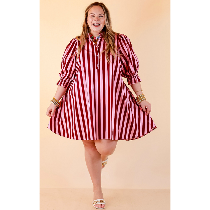 Talk of the Town Striped Ruffle Sleeve Babydoll Dress with Cinched Waist Feature in Maroon and Pink