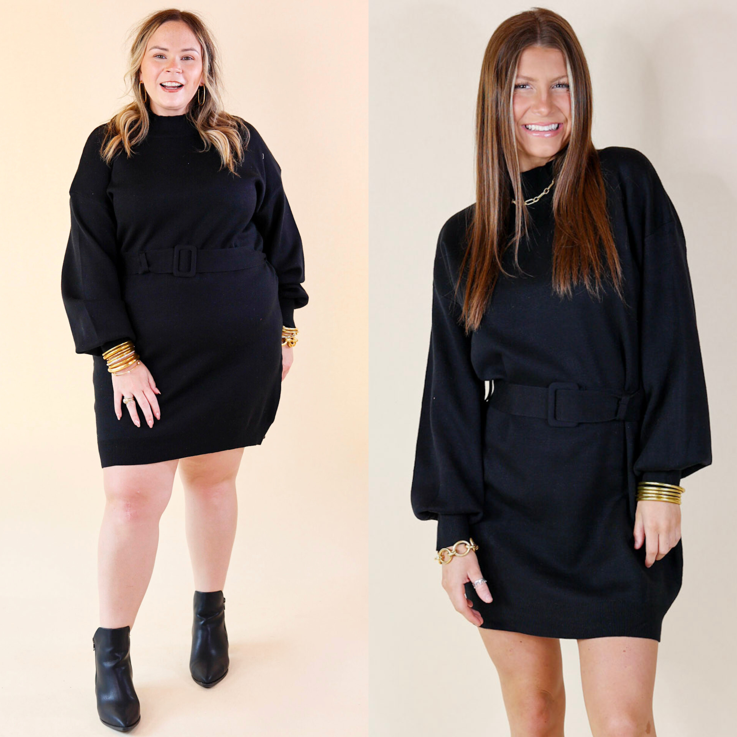 Models are wearing a black long sleeve sweater dress with a  belted waist. Both models have this dress paired with black booties and gold jewelry.