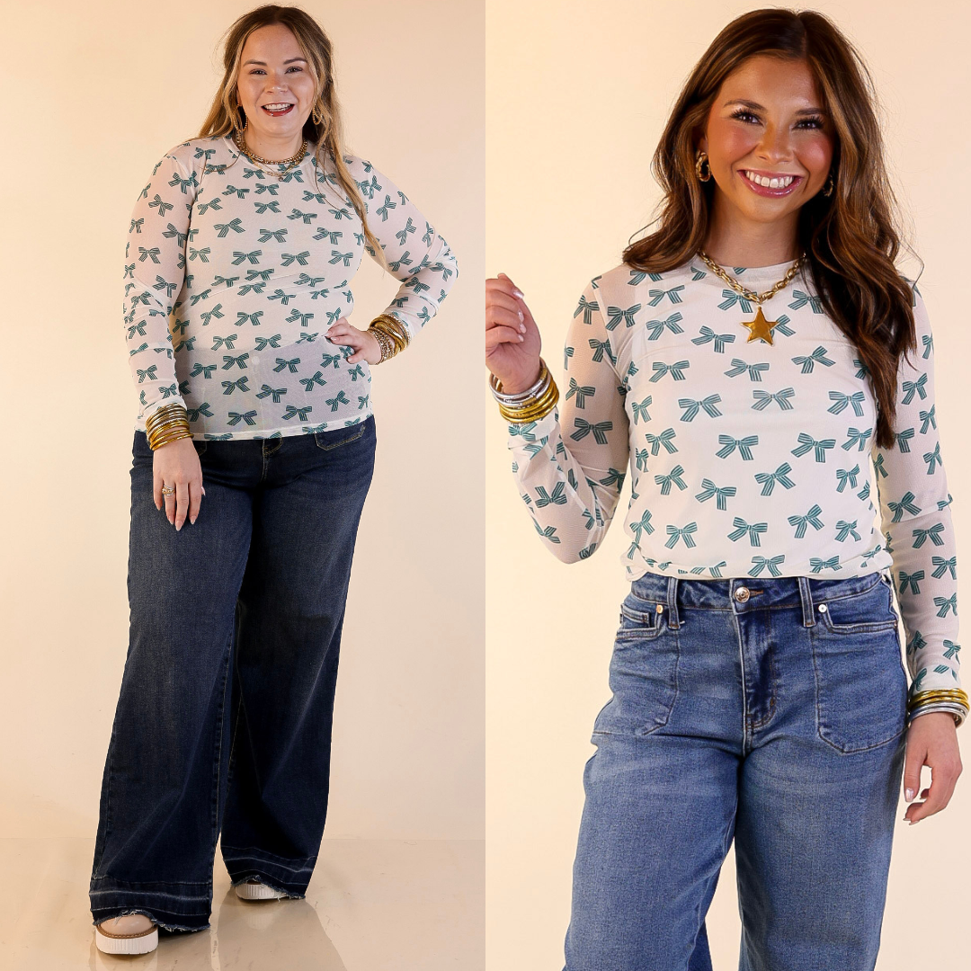 Models are wearing Bow Print Mesh Long Sleeve Top in Ivory and Green and jeans on a plain background