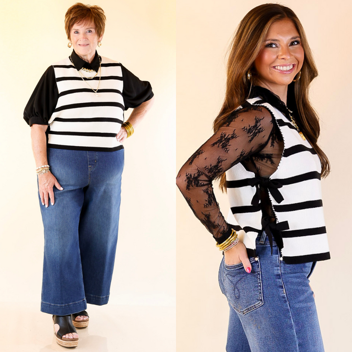 Two women wearing black and white striped tops with blue jeans against a beige background